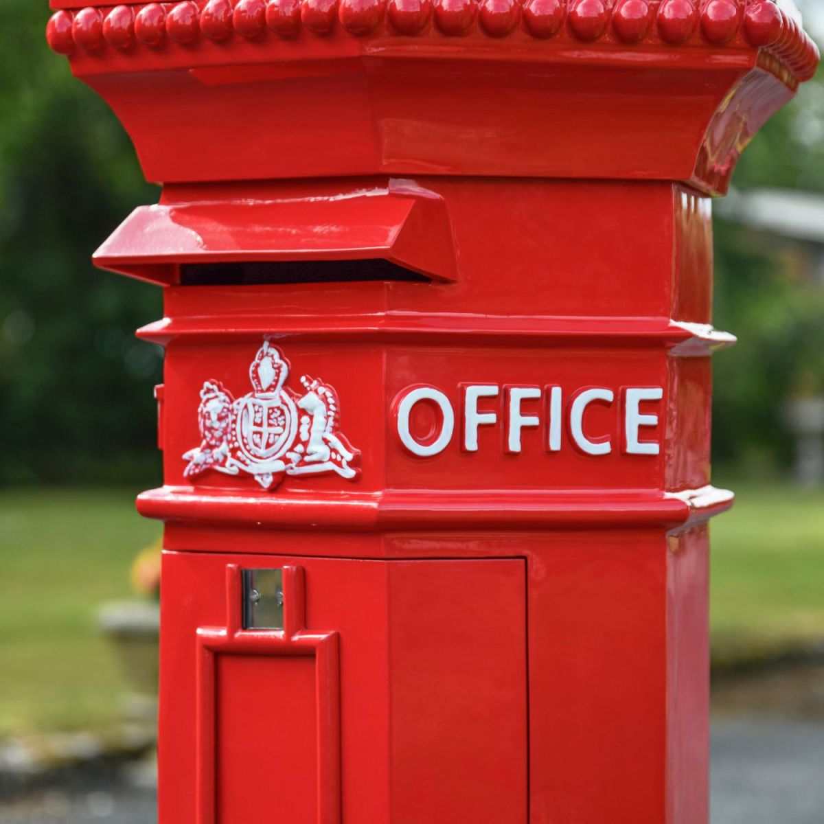 Close-Up on White Detailing on Penfold Pillar Post Box - Red Finish Close-Up on White Detailing on Penfold Pillar Post Box - Red Finish