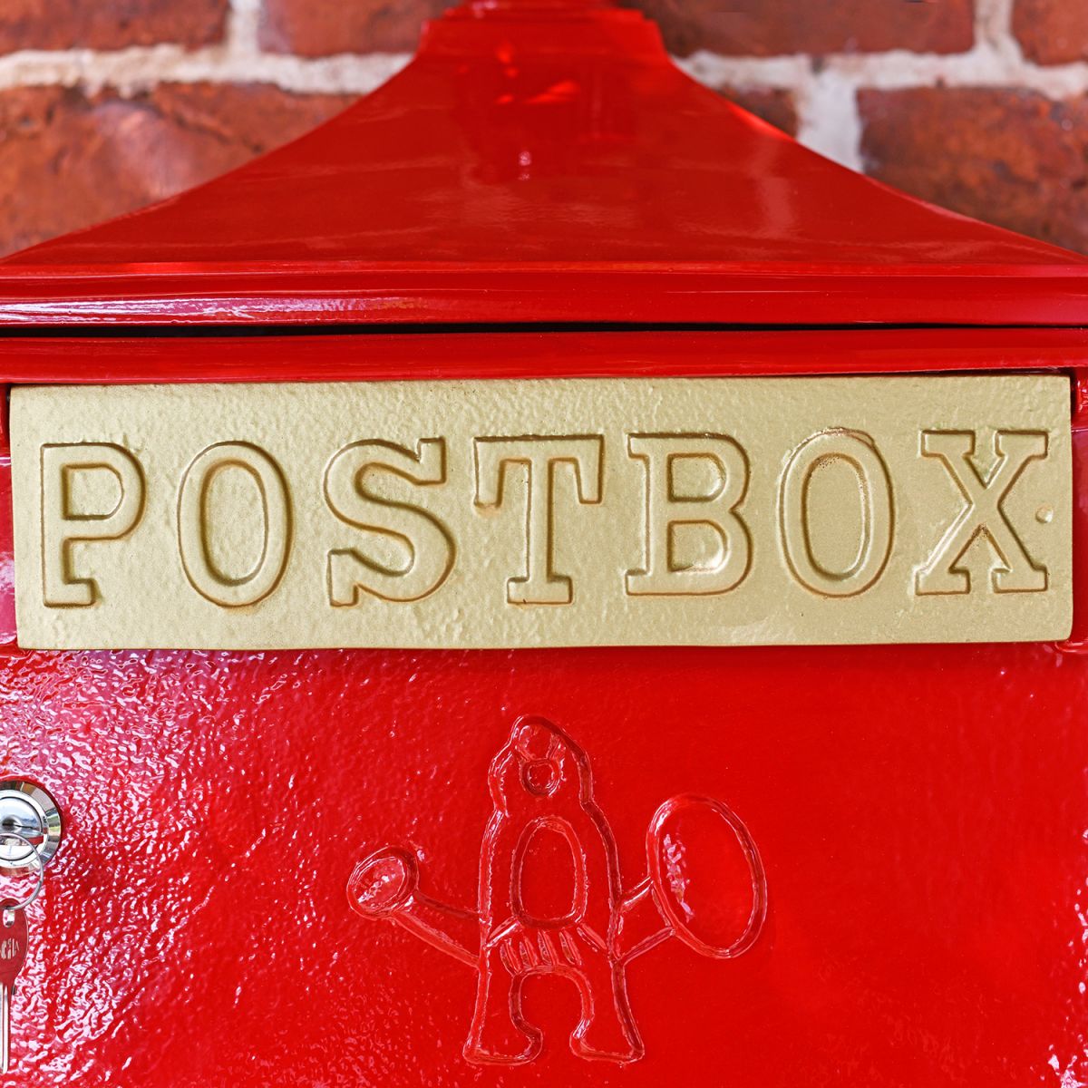 "POSTBOX" Written on the Gold Letter Flap of the Post Box