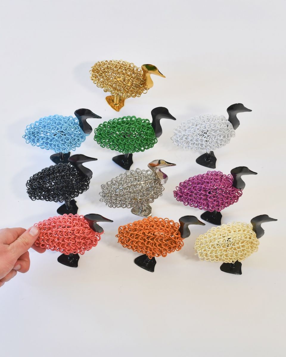 All colours of recycled metal duck sculpture