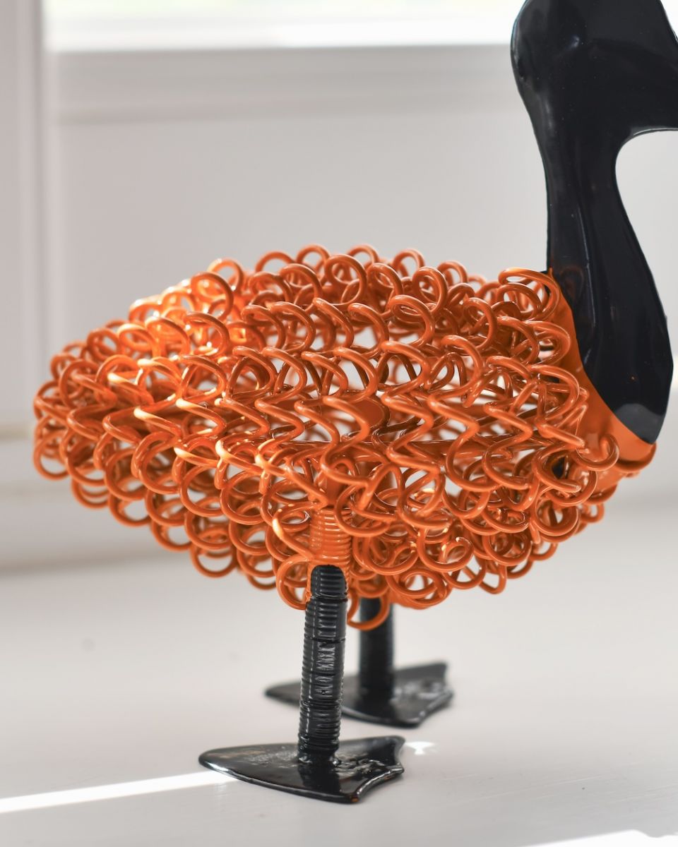 Close up of curly body detail on scrap metal art sculpture