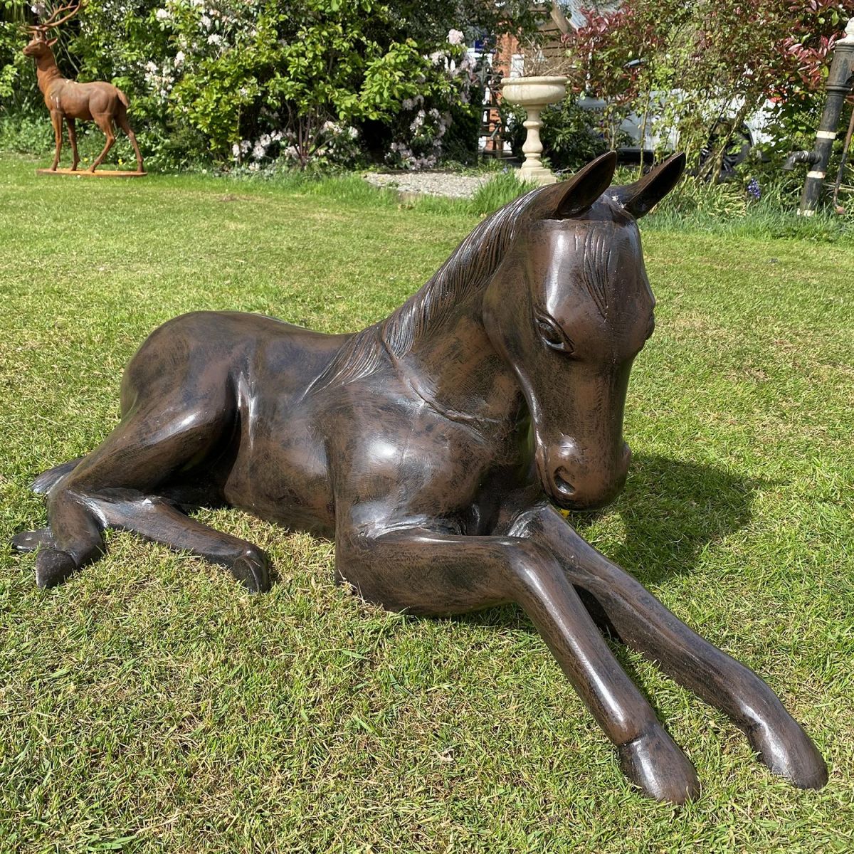 Resting Foal Sculpture in Situ in the Garden