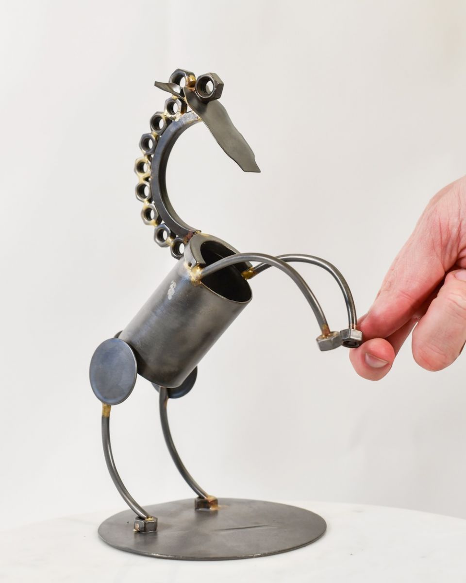 Scale image of recycled metal art sculpture Scale image of recycled metal art sculpture