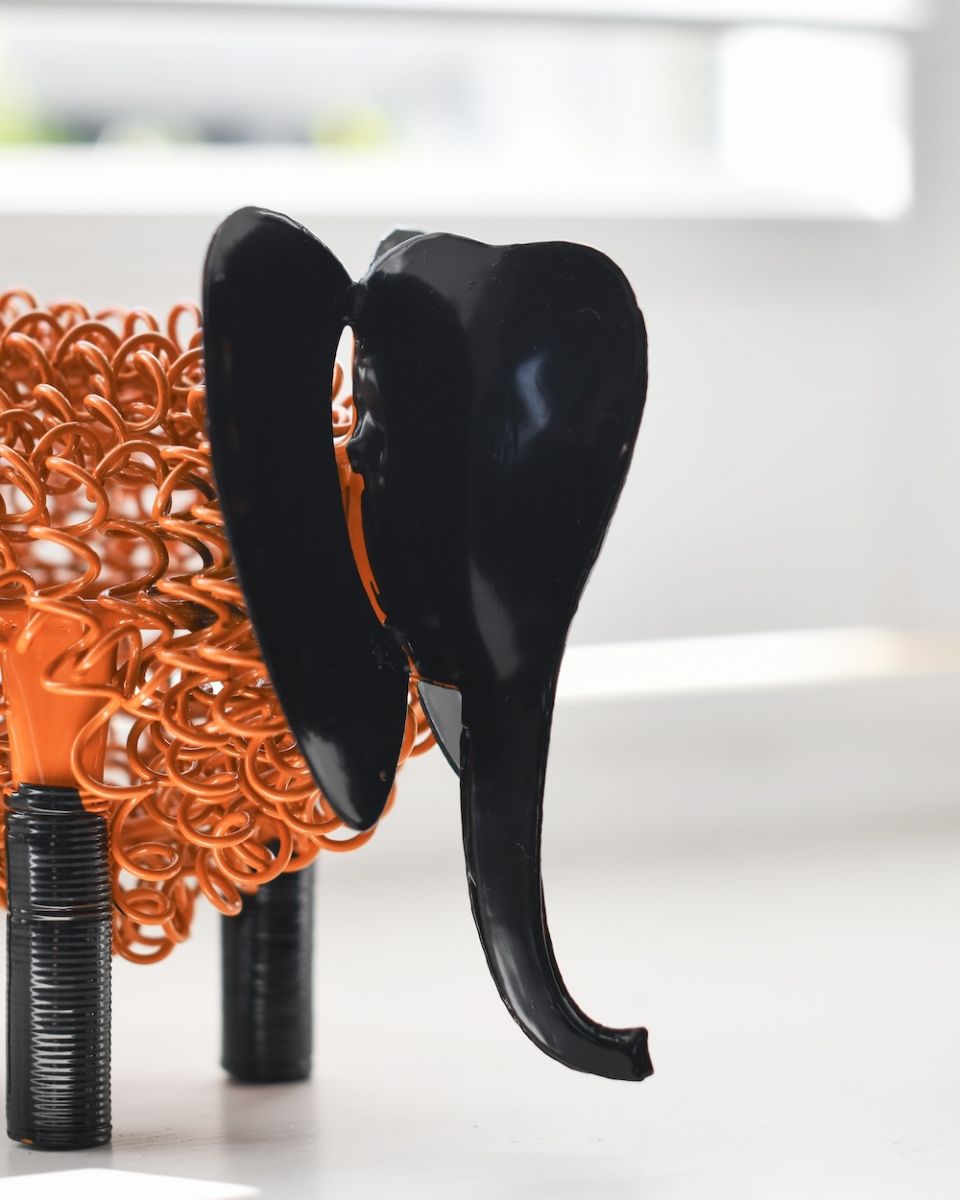 Close up of intricate face detail on recycled metal art sculpture Close up of intricate face detail on recycled metal art sculpture