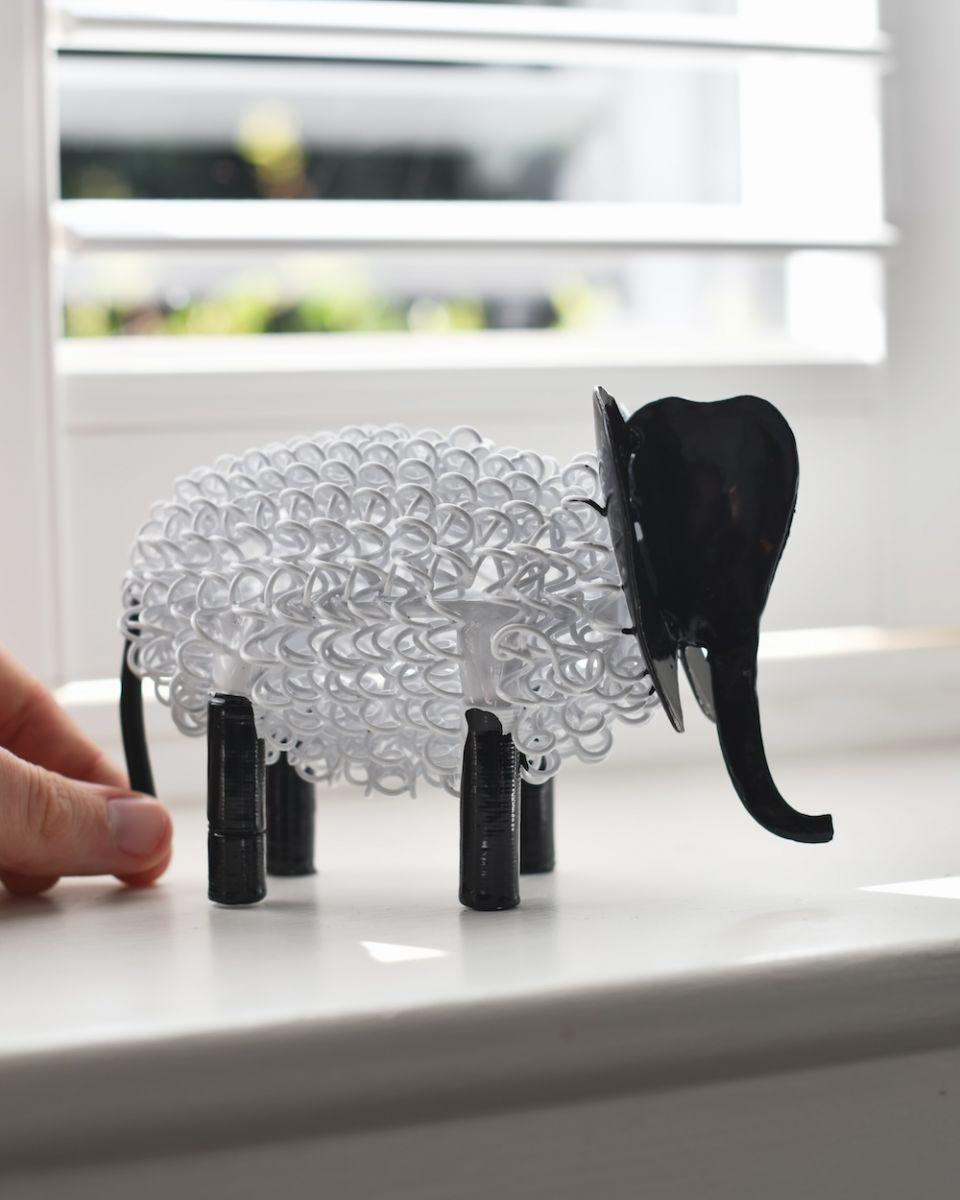 Scale image of recycled metal art sculpture Scale image of recycled metal art sculpture