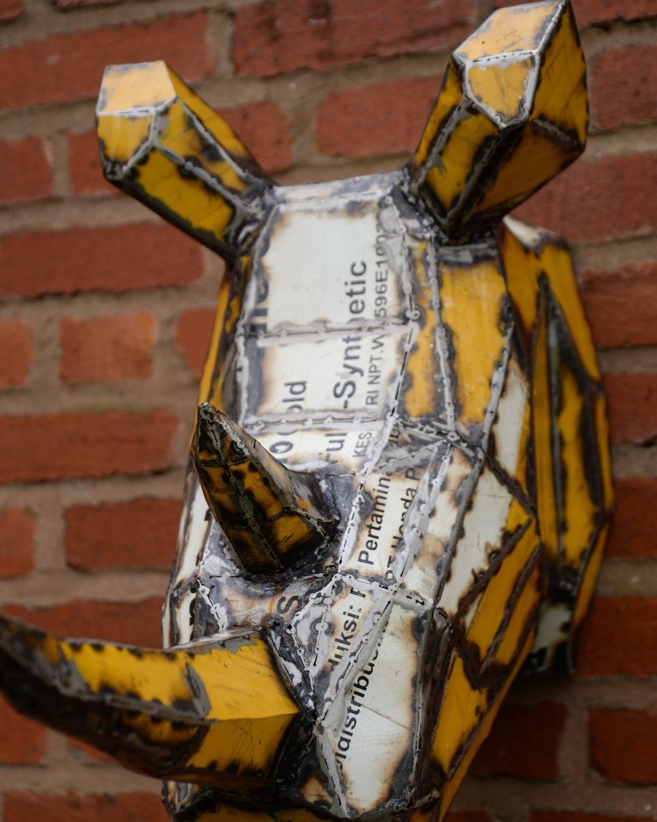 ‘Volt’ the Rhino Head Mount Wall Art mounted on brick wall close up image