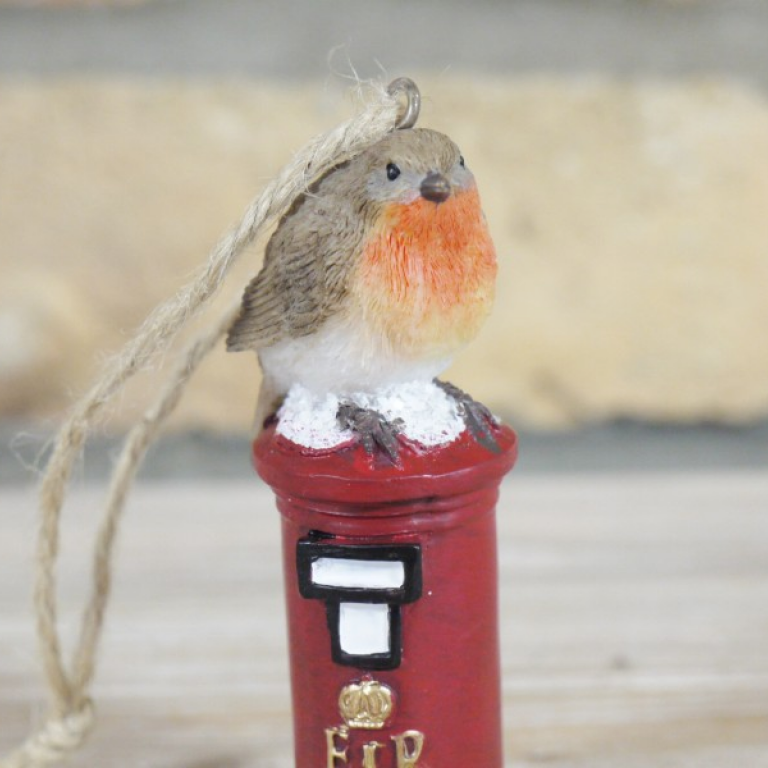 Close-up of the Robin Sitting on the Postbox