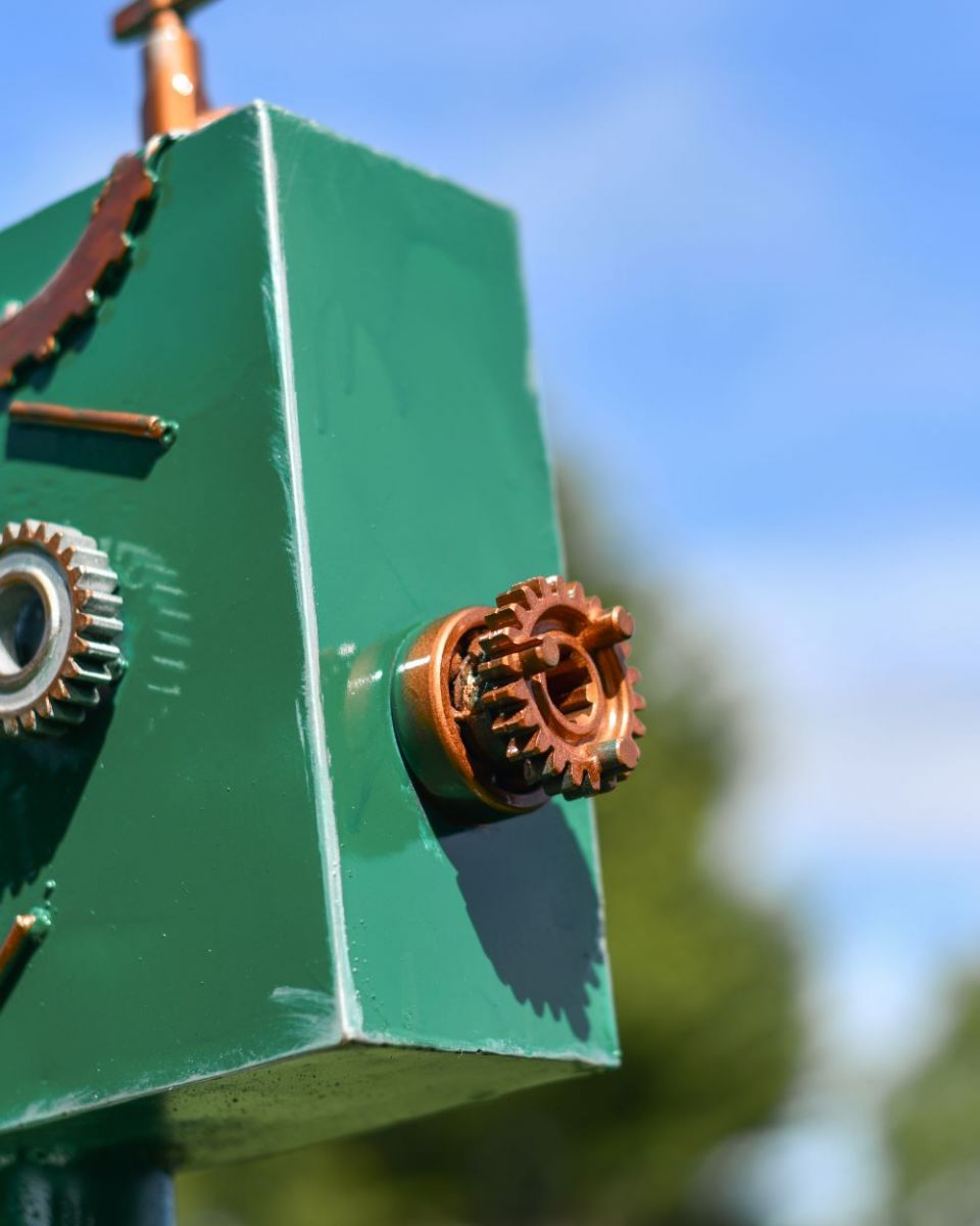 Close up of Rodney Recycled Metal Robot Sculpture head detailing Close up of Rodney Recycled Metal Robot Sculpture head detailing