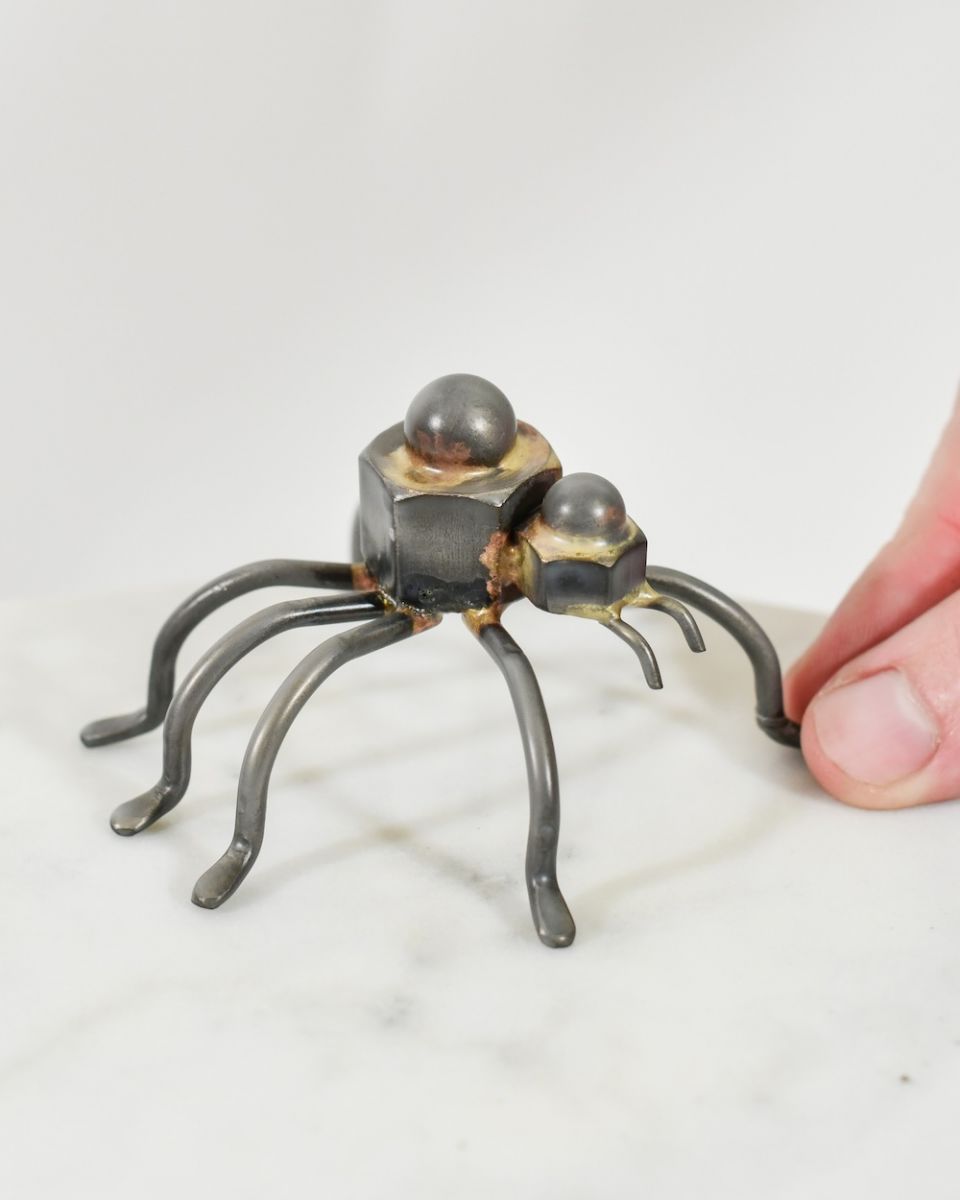 Scale image of recycled metal art sculpture Scale image of recycled metal art sculpture