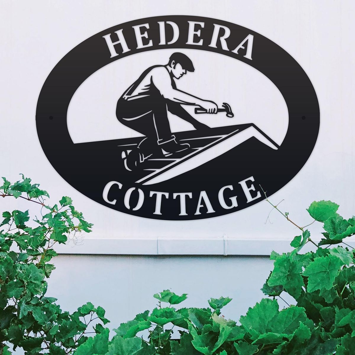 Roofer Iron Oval House Sign on a White Wall