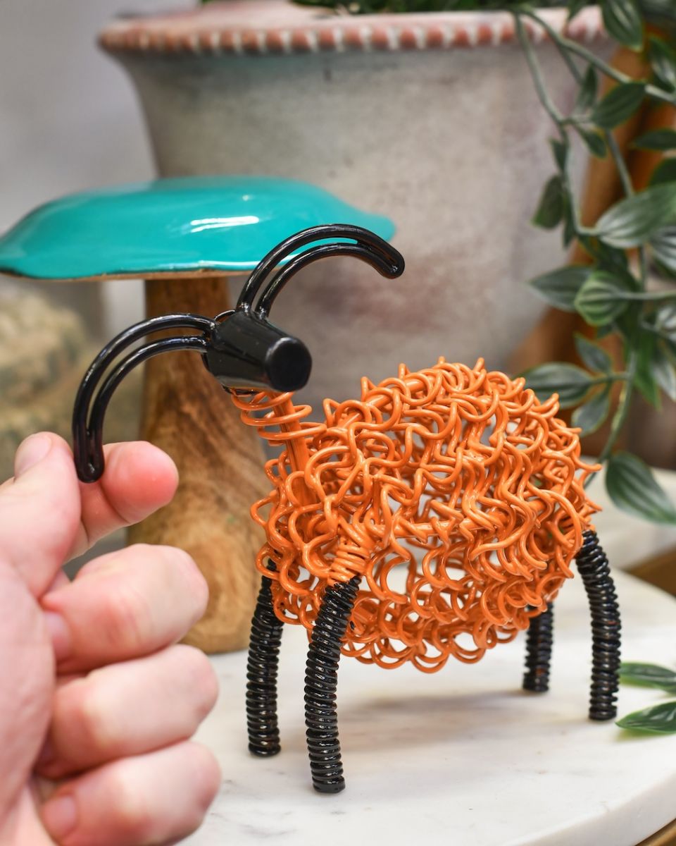 Scale of recycled metal art sculpture