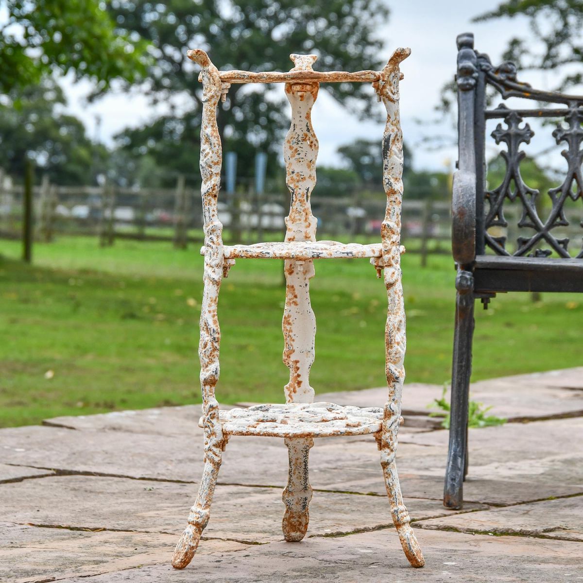 "Rose" Aged Rustic Cream Cast Iron Side Stand in Situ "Rose" Aged Rustic Cream Cast Iron Side Stand in Situ