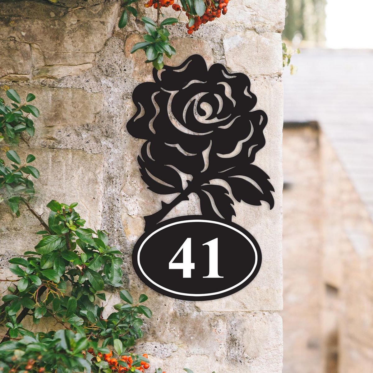 Rose Iron House Number Sign on a Garden Wall