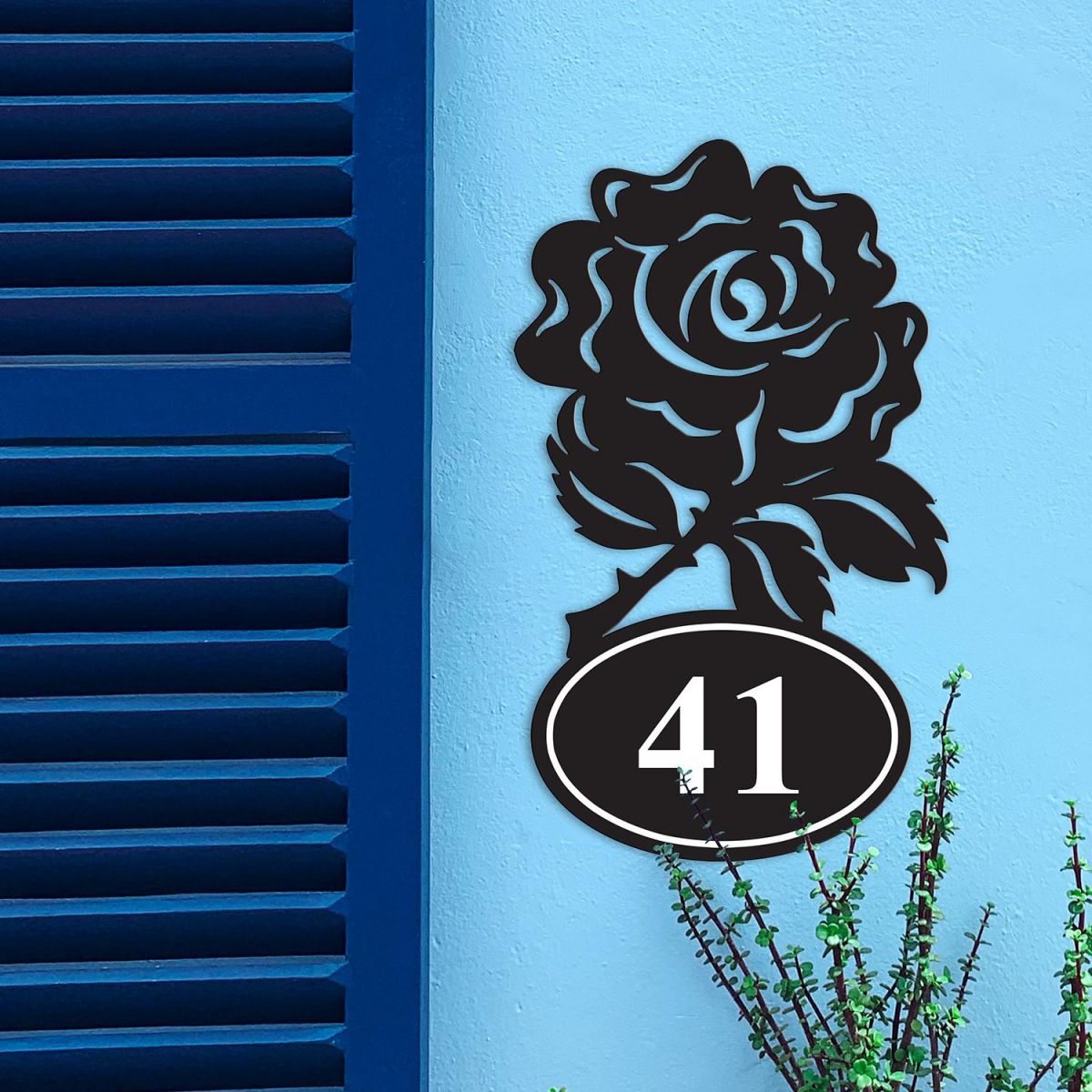 Rose Iron House Number Sign in Situ on a Blue Wall
