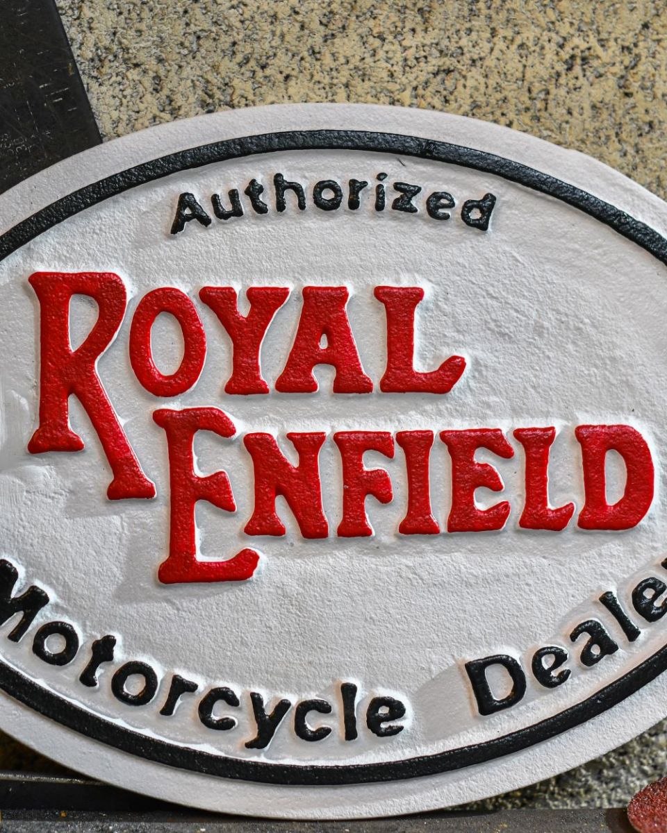Close up of "Royal Enfield" Cast Iron Automobilia Reproduction Sign finish Close up of "Royal Enfield" Cast Iron Automobilia Reproduction Sign finish