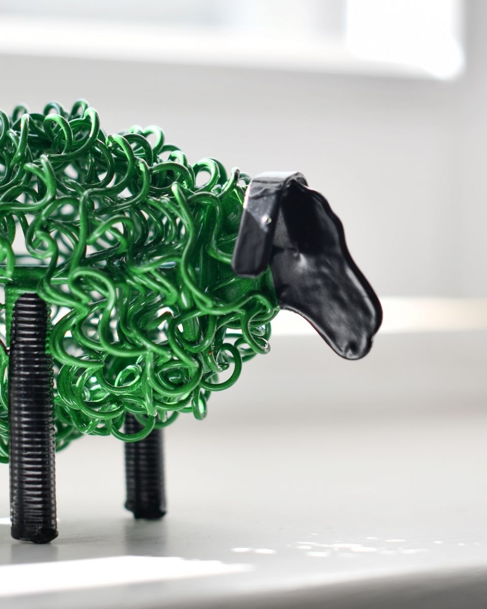 Close up of face detail on recycled metal art sculpture Close up of face detail on recycled metal art sculpture