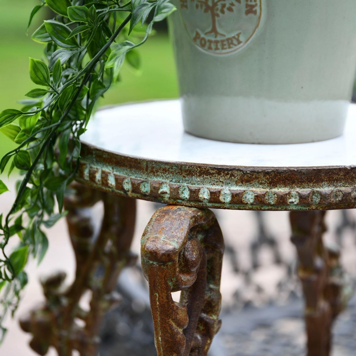 Close up of Rustic Cast Iron Side Table Close up of Rustic Cast Iron Side Table