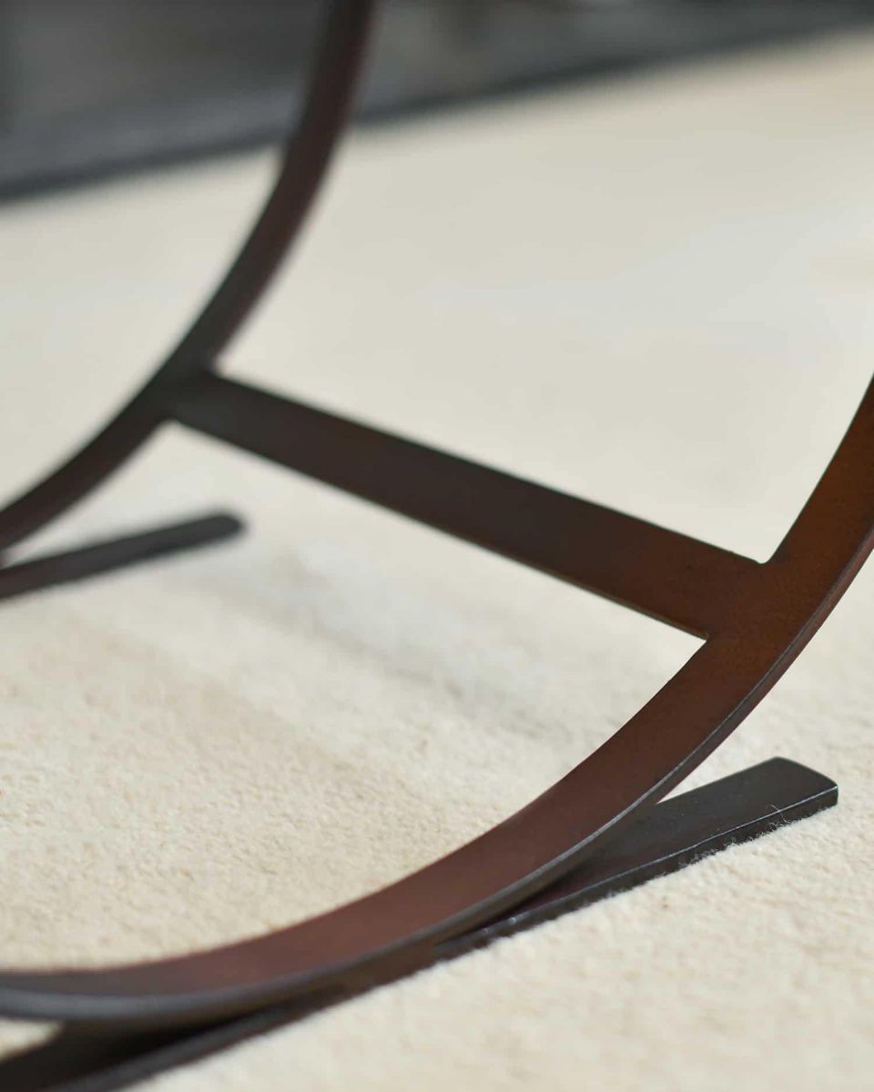 Close-Up of Rustic Finish on Blacksmith Curved Log Rack