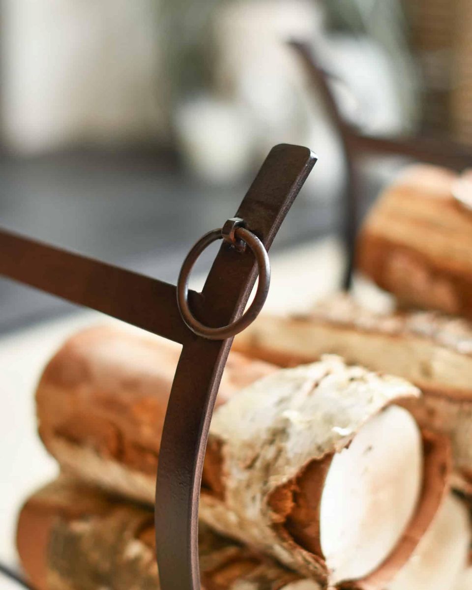 Close-Up of Rustic Blacksmith Curved Log Rack