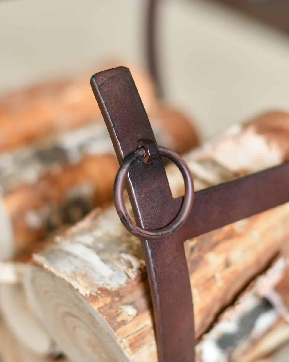 Close-Up of Looped Handles on Rustic Blacksmith Curved Log Rack