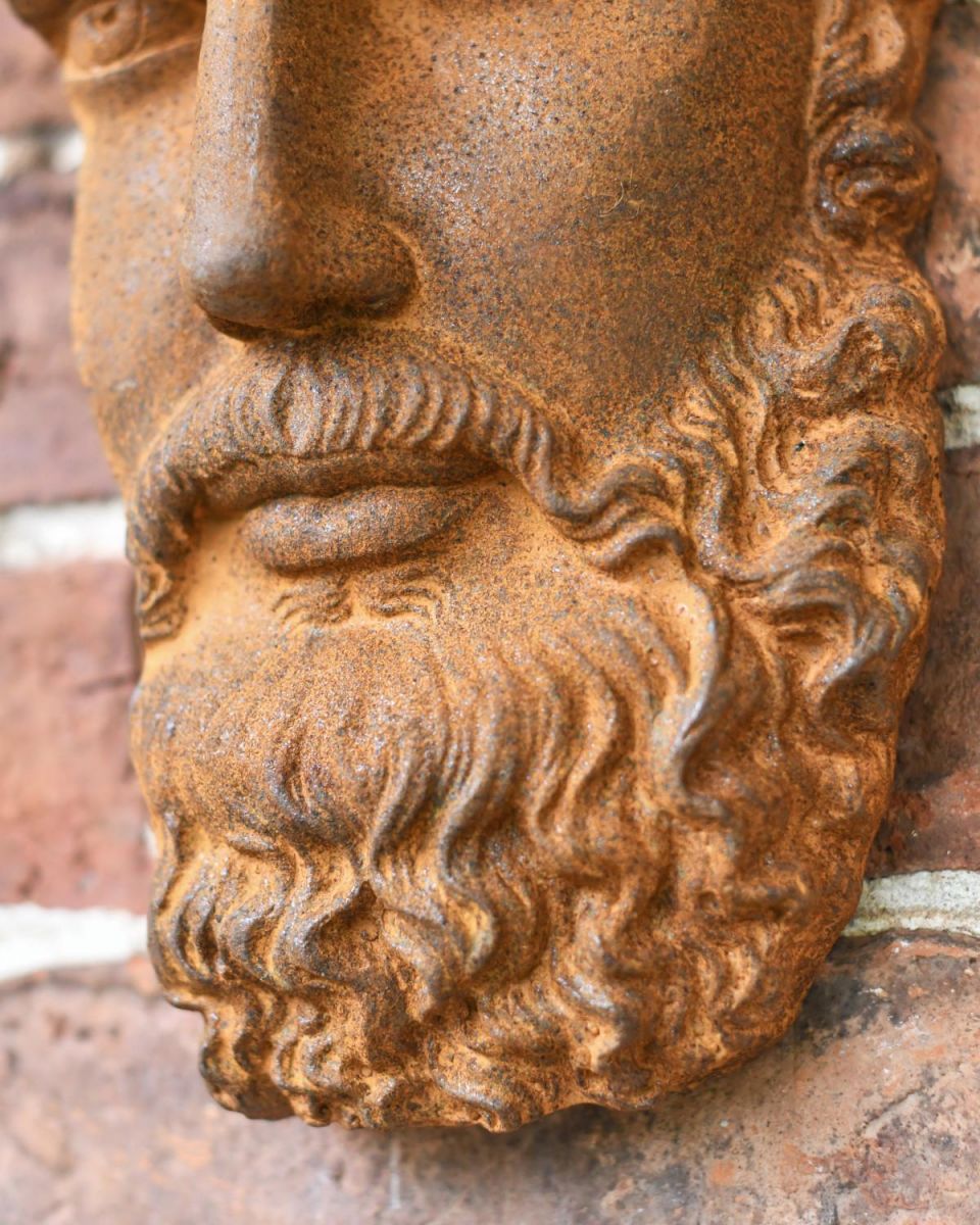 Close-Up of Cast Iron Detailing on Exterior Wall Art