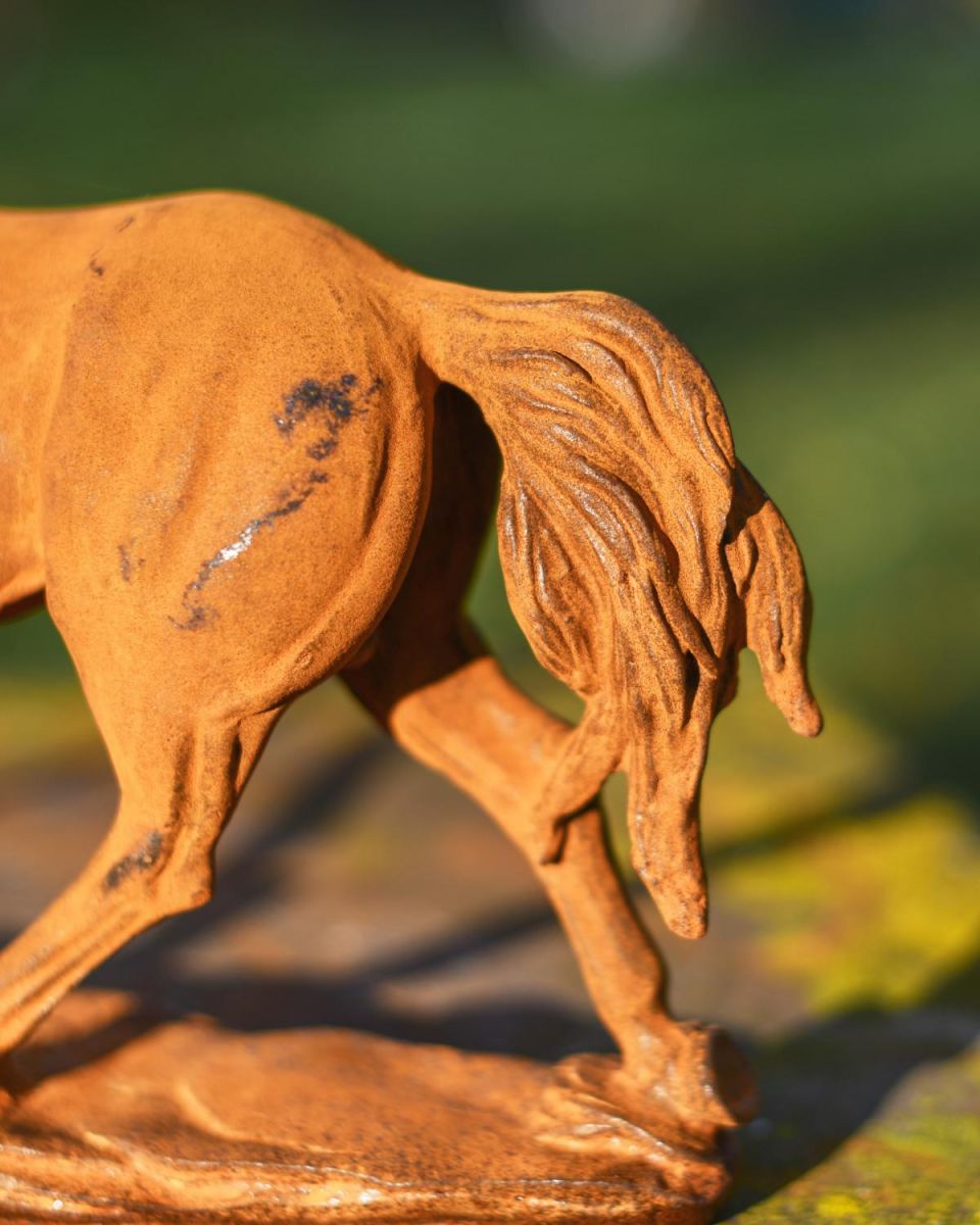 Close-Up of Rustic Cast Iron "Horse in Gallop" Garden Sculpture Close-Up of Rustic Cast Iron "Horse in Gallop" Garden Sculpture