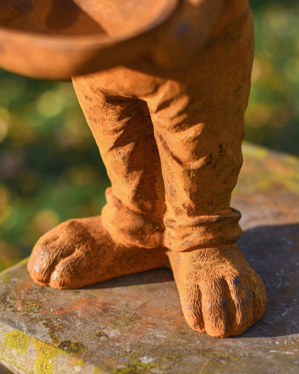 Close-up of the Rustic Feet on the Rabbit Sculpture and Bird Bath Close-up of the Rustic Feet on the Rabbit Sculpture and Bird Bath