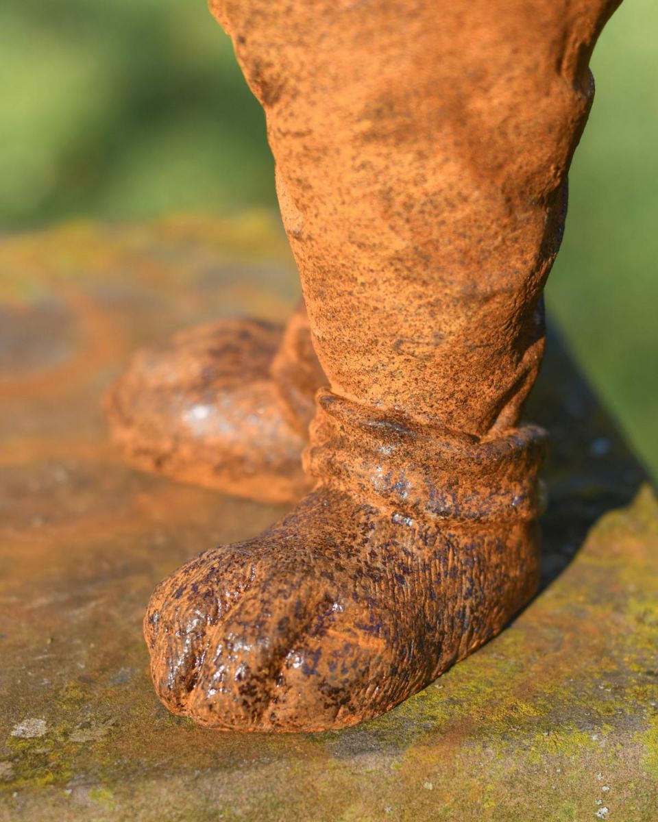 Close Up Of Rustic Cast Iron Rabbit Holding Bowl Sculpture & Bird Bath Feet Close Up Of Rustic Cast Iron Rabbit Holding Bowl Sculpture & Bird Bath Feet