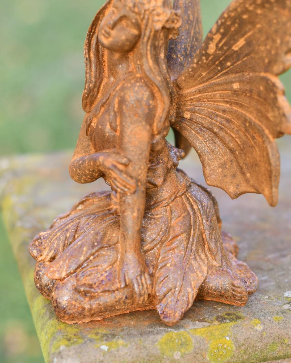Close-Up of Rustic Cast Iron "Sitting Angel" Garden Sculpture