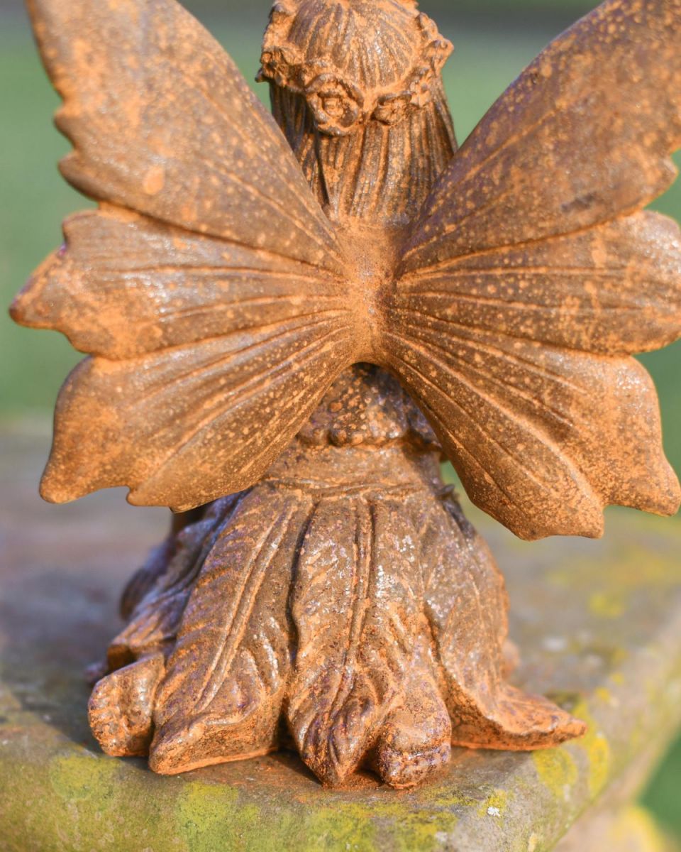 View of Rustic Cast Iron "Sitting Angel" Garden Sculpture in Situ