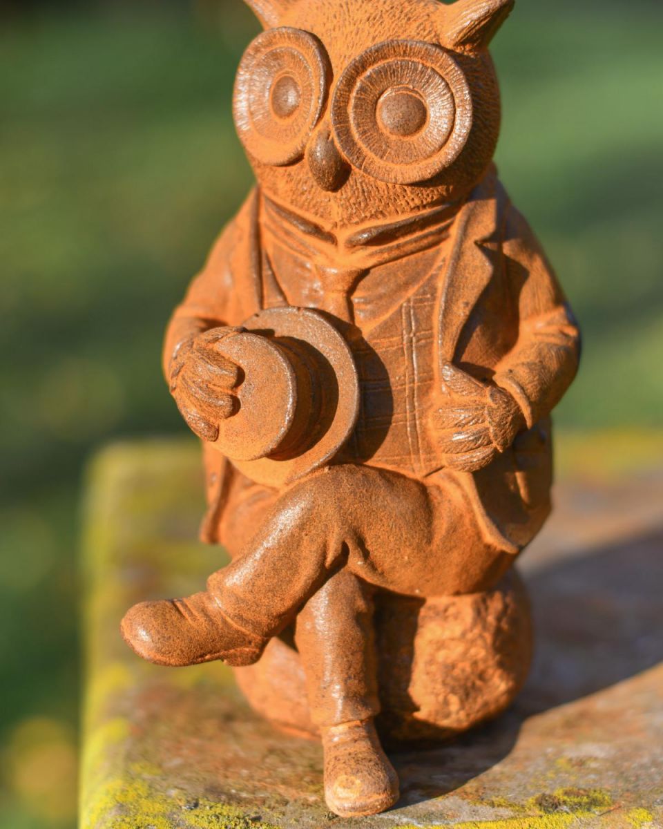 Close-Up of Rustic Cast Iron "Suited & Booted" Owl Garden Sculpture Close-Up of Rustic Cast Iron "Suited & Booted" Owl Garden Sculpture