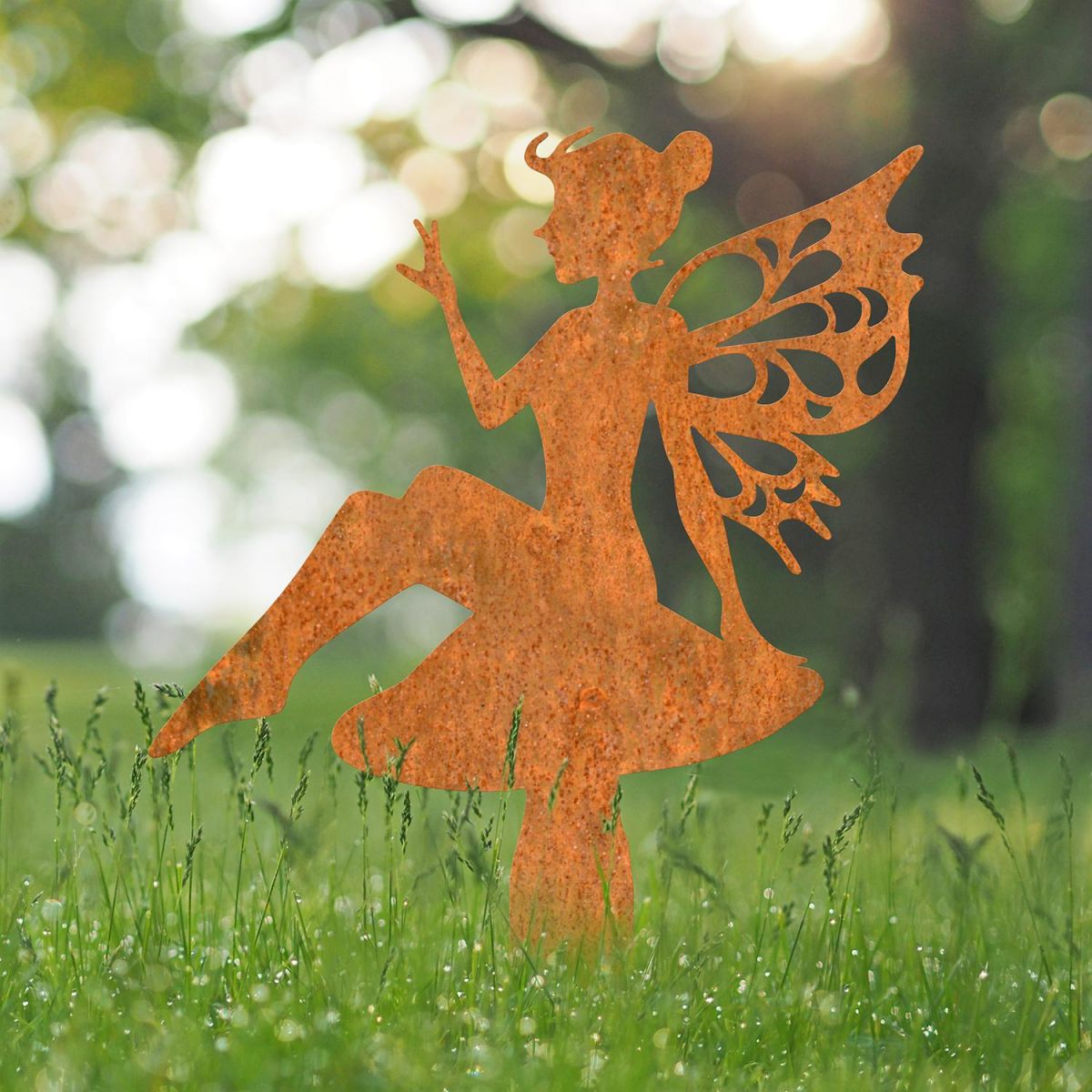 Flower Fairy Sitting on Toad Stool Silhouette in Situ in the Garden