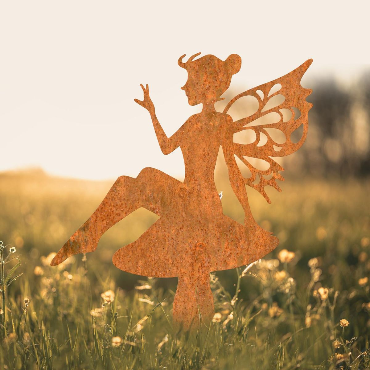 Flower Fairy Sitting on Toad Stool Silhouette in Use in a Field