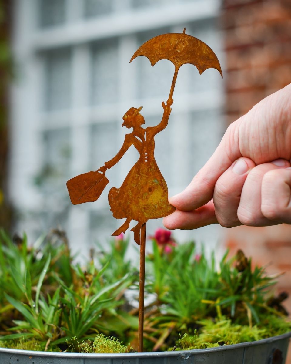 Rustic Flying Nanny Artistic Plant Pot Spike - Set of Two with hand in shot for scale