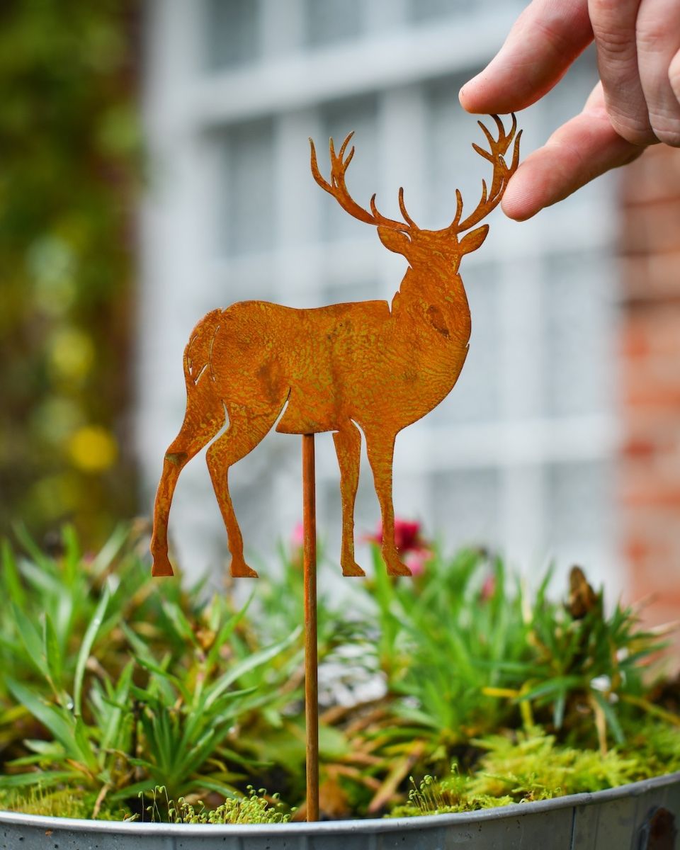 Rustic Highland Stag Artistic Plant Pot Spike - Set of Two with hand in shot for scale