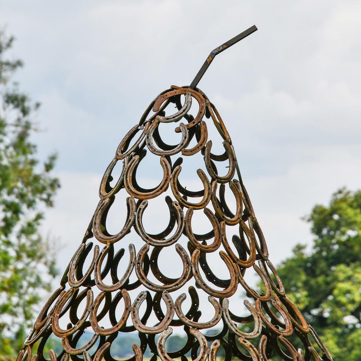 Close-up of the Top of the Rustic Horseshoe Pear Sculpture