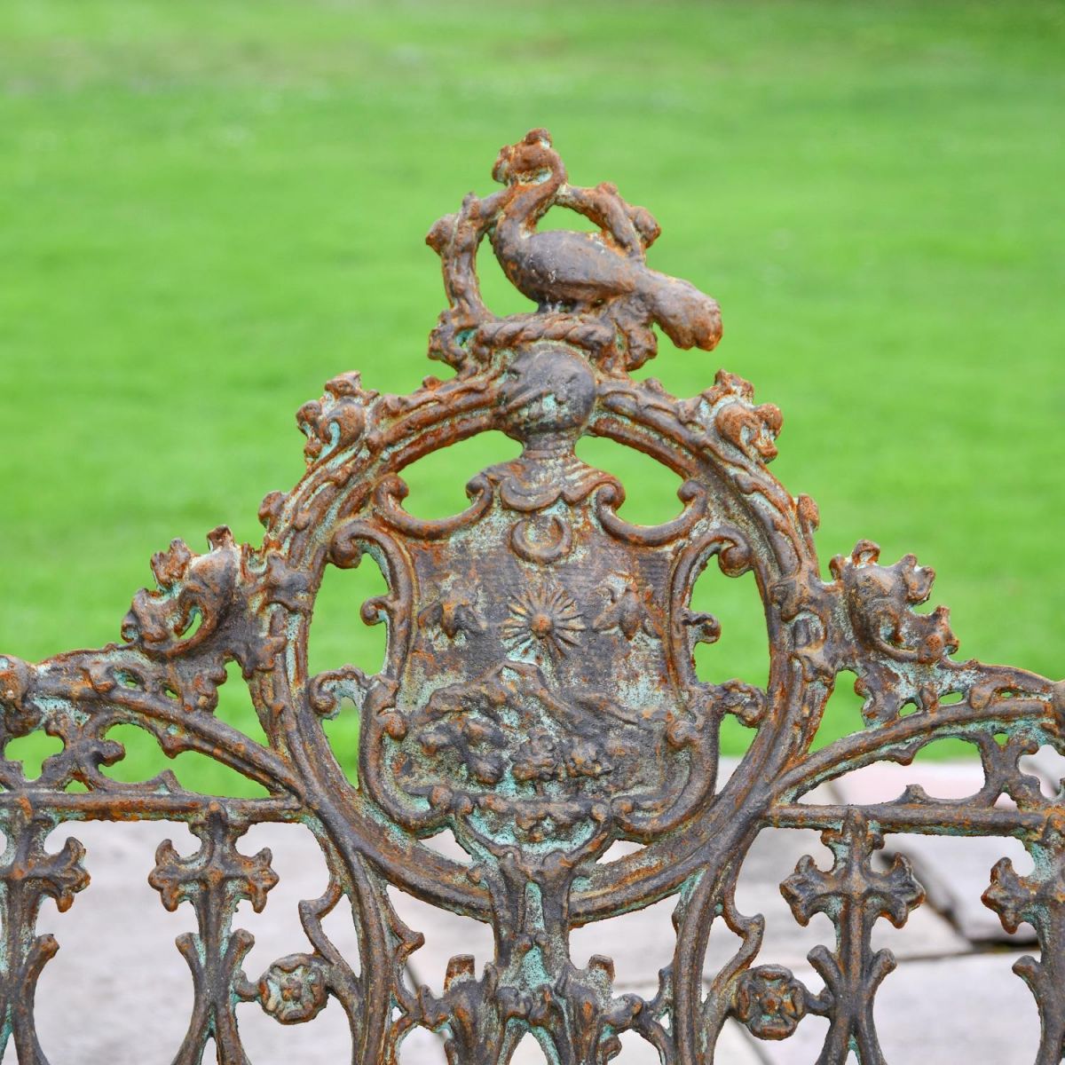 Close up of decorative gothic cast iron motif on backrest