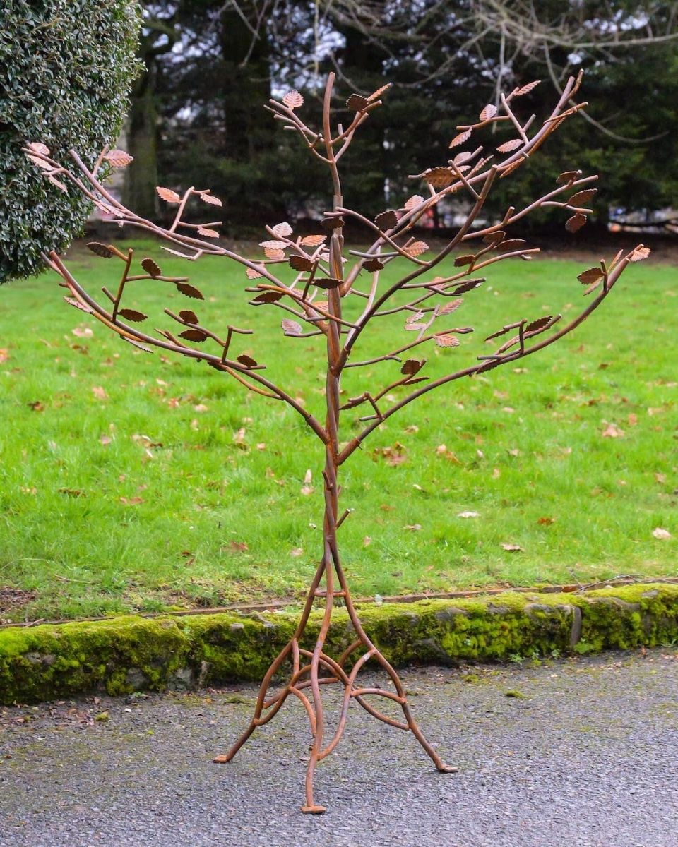 130cm Rustic Metal Tree Sculpture Garden Ornament with Leaves with Lawn in Background