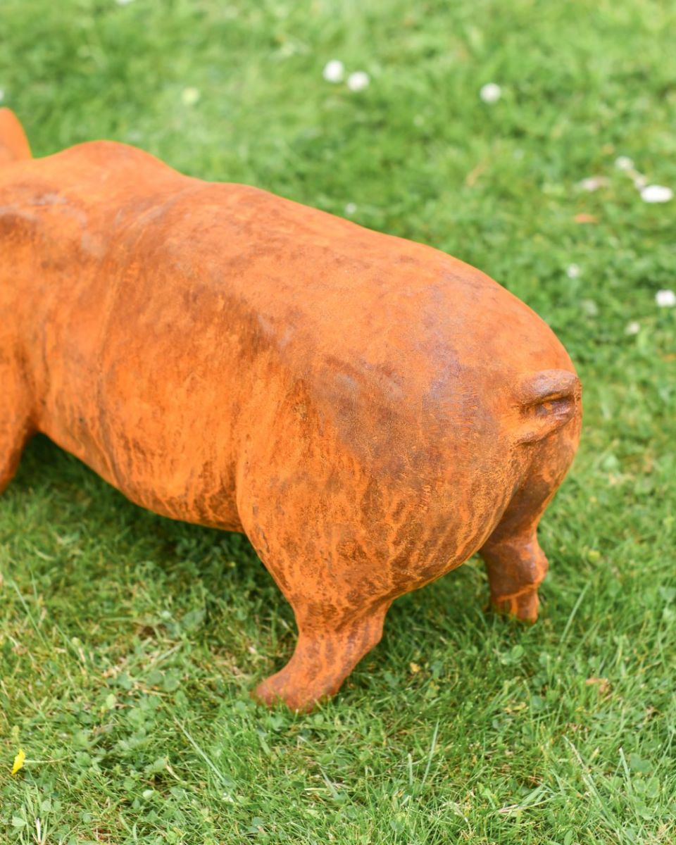 Close up of Rustic Pig Cast Iron Sculpture tail