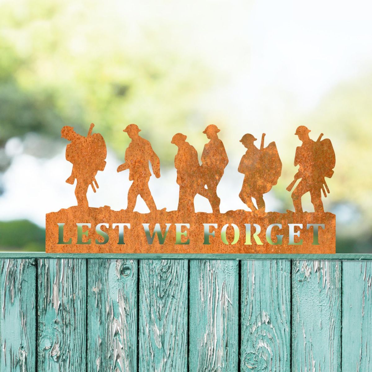 Walking Soldiers "Lest We Forget" Memorial Fence Topper in Rustic Finish in Situ