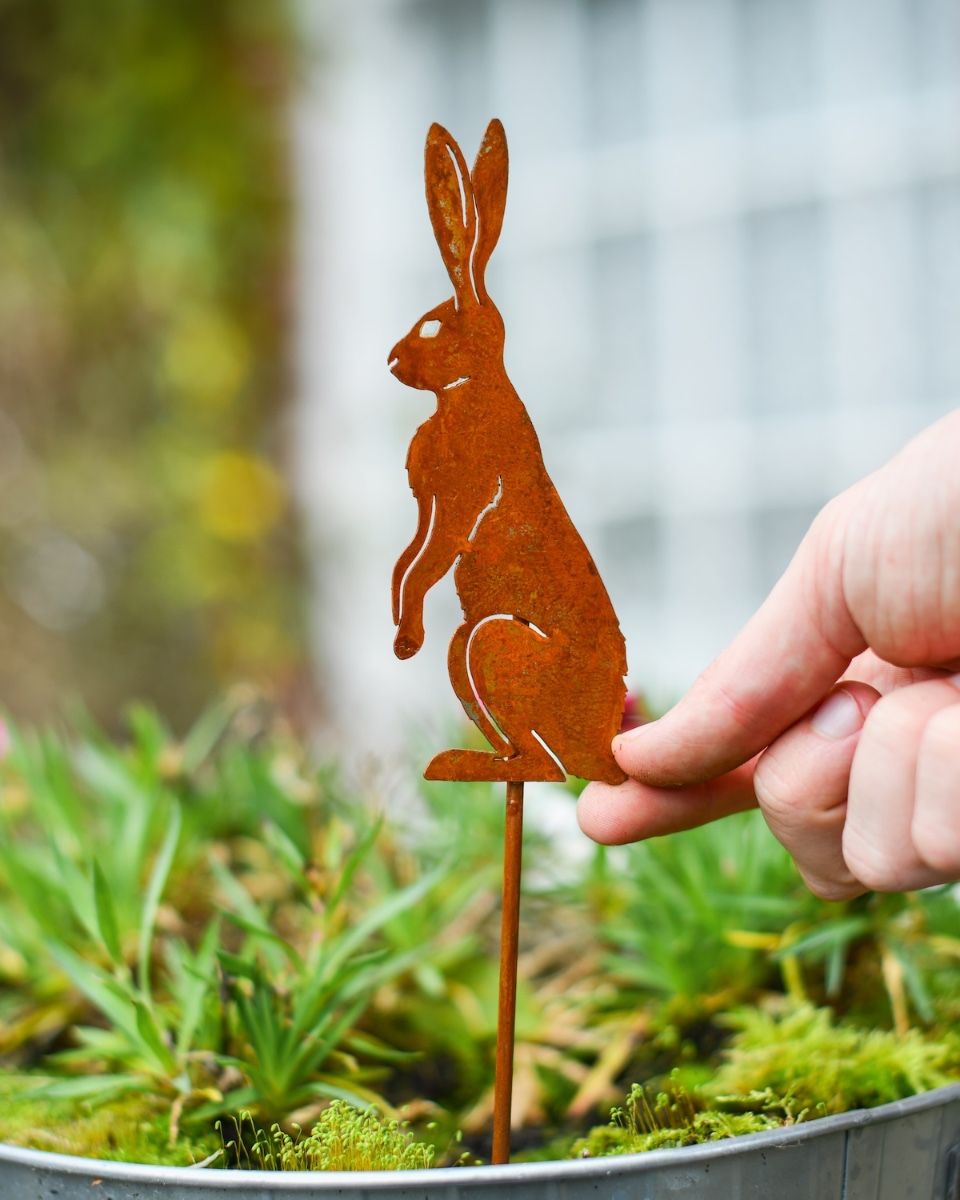 Rustic Watchful Hare Artistic Plant Pot Spike - Set of Two with hand in shot for scale