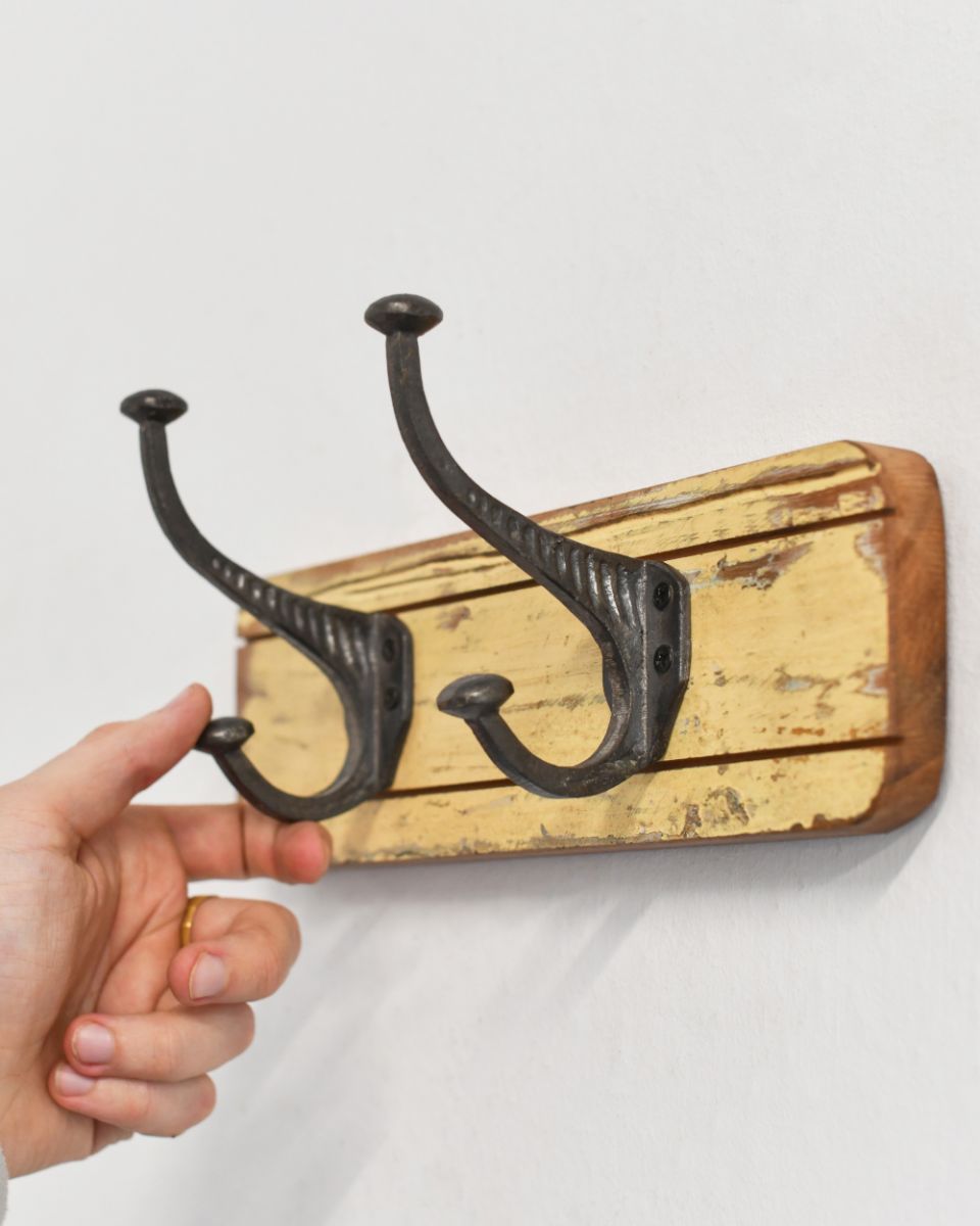 Rustic Wood And Iron Coat Hooks in yellow to scale