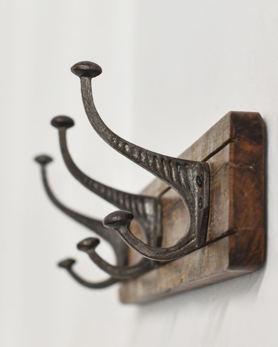 Close up of hooks on Rustic Wood And Iron Coat Hooks
