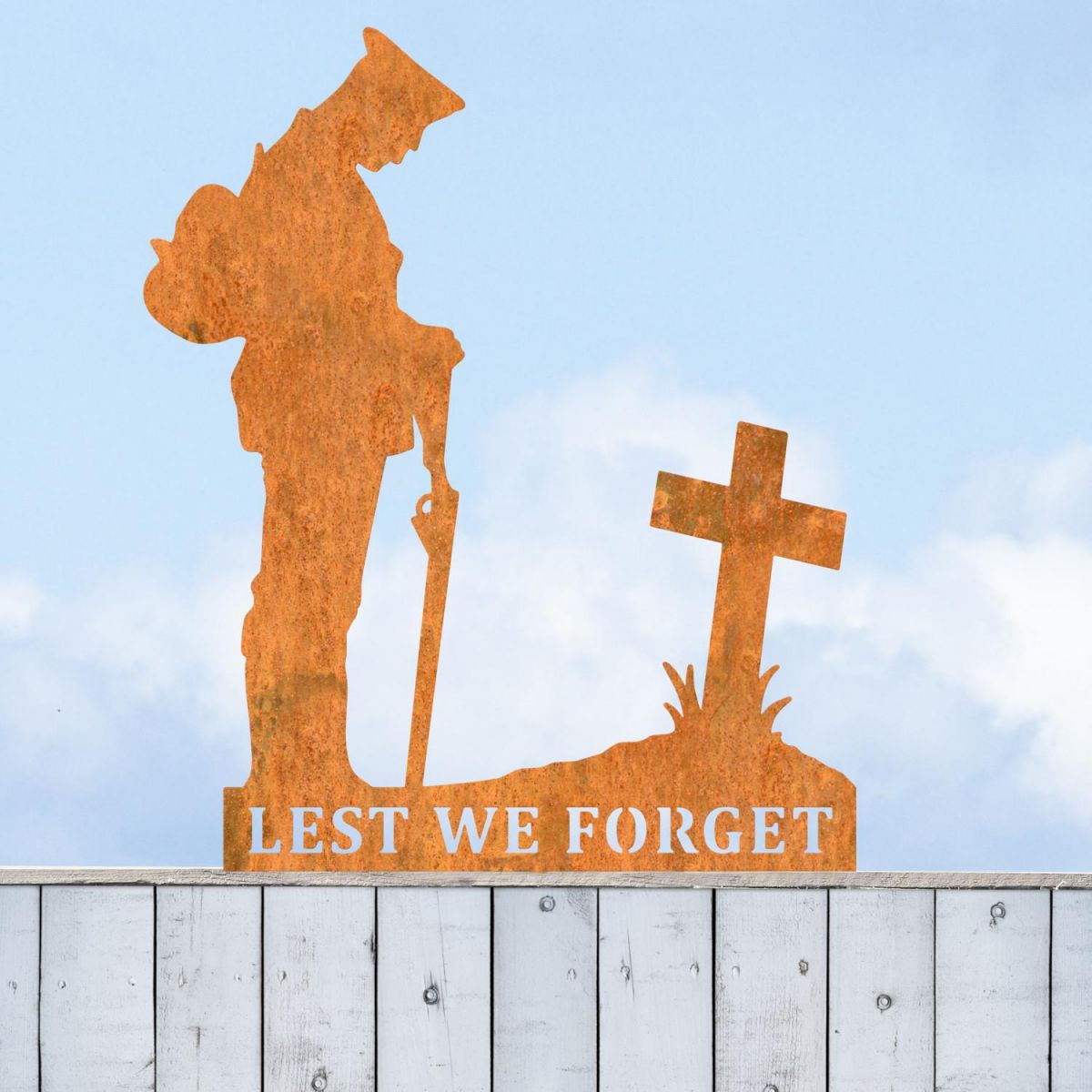 Rustic WW2 Soldier "Lest We Forget" Memorial Fence Topper in Situ
