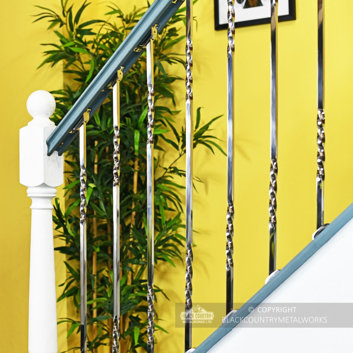 Chrome Stair Spindles fitted in staircase Chrome Stair Spindles fitted in staircase