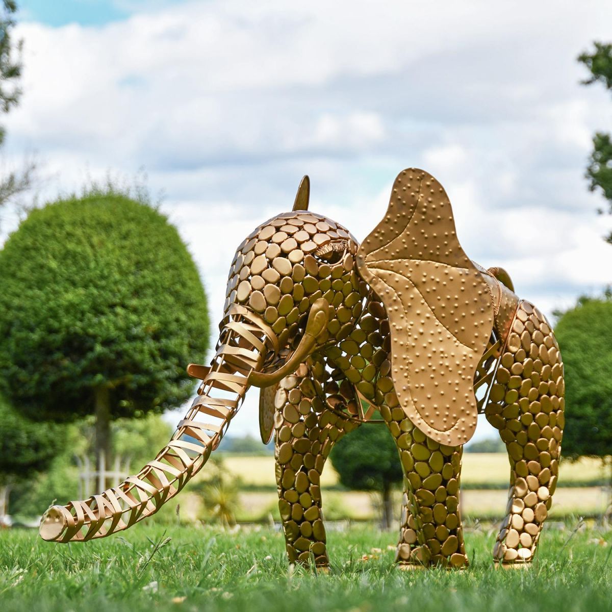 "Sambaku" Gold Garden Elephant Sculpture in Use in the Garden