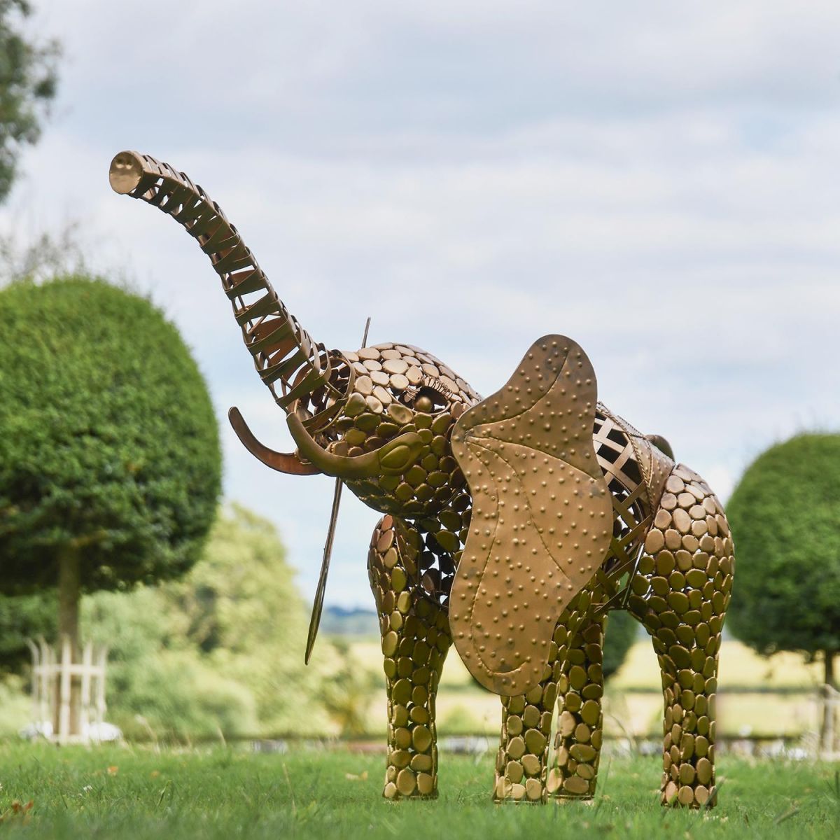 "Sambaku" Gold Garden Elephant Sculpture in Use in the Garden