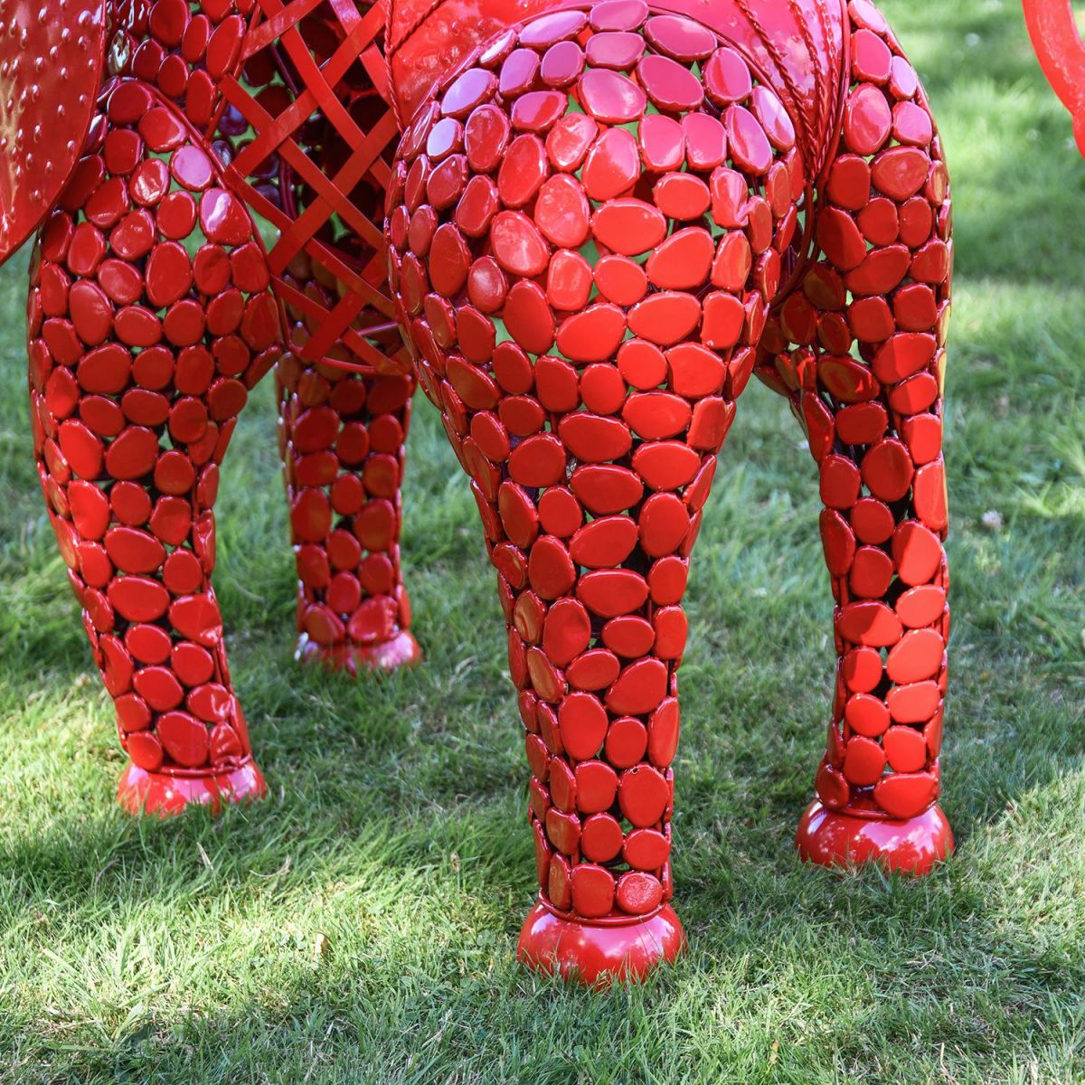 View of the Legs on the "Sambaku" Red Garden Elephant Sculpture View of the Legs on the "Sambaku" Red Garden Elephant Sculpture