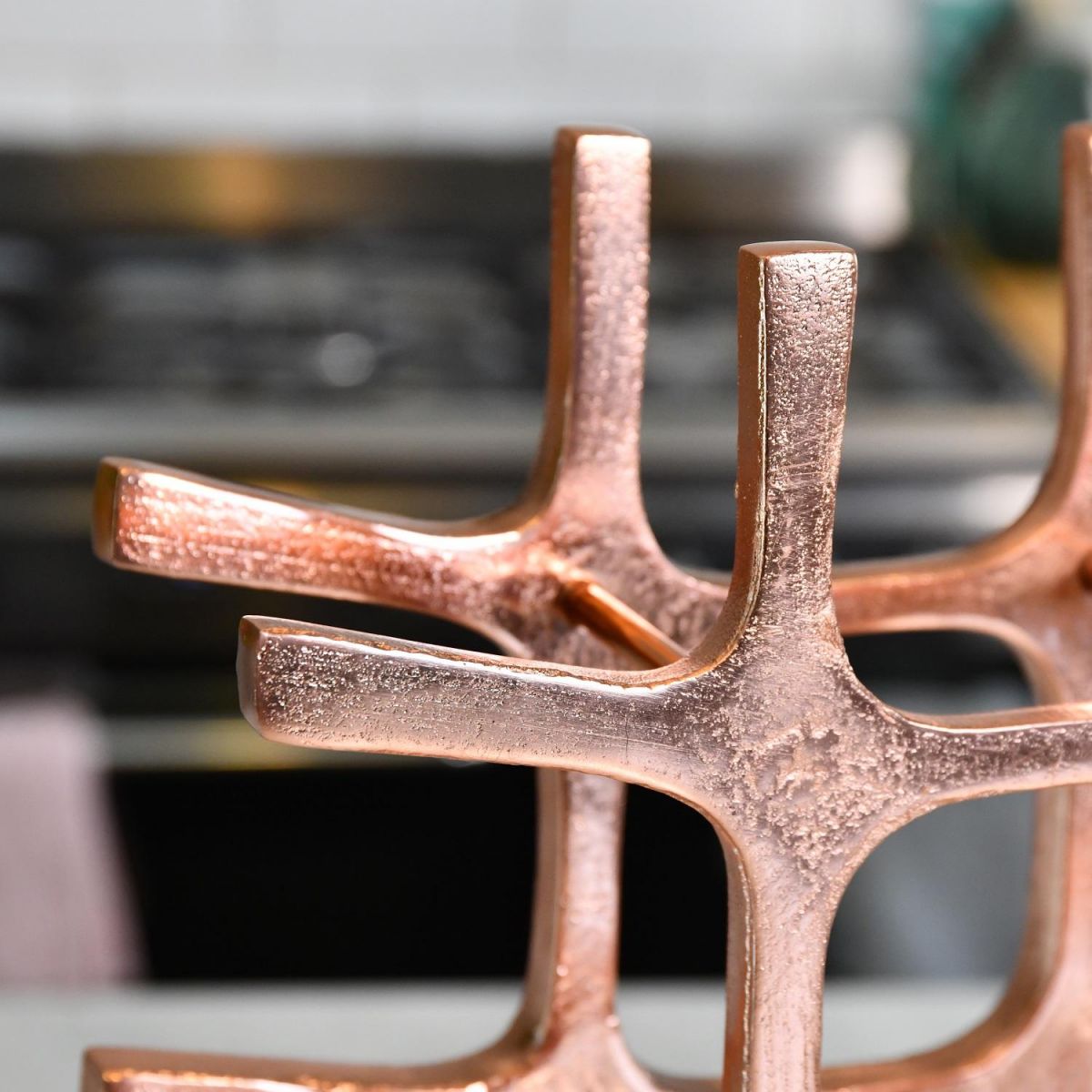 Close up of Copper "Kempton House" Wine Rack 