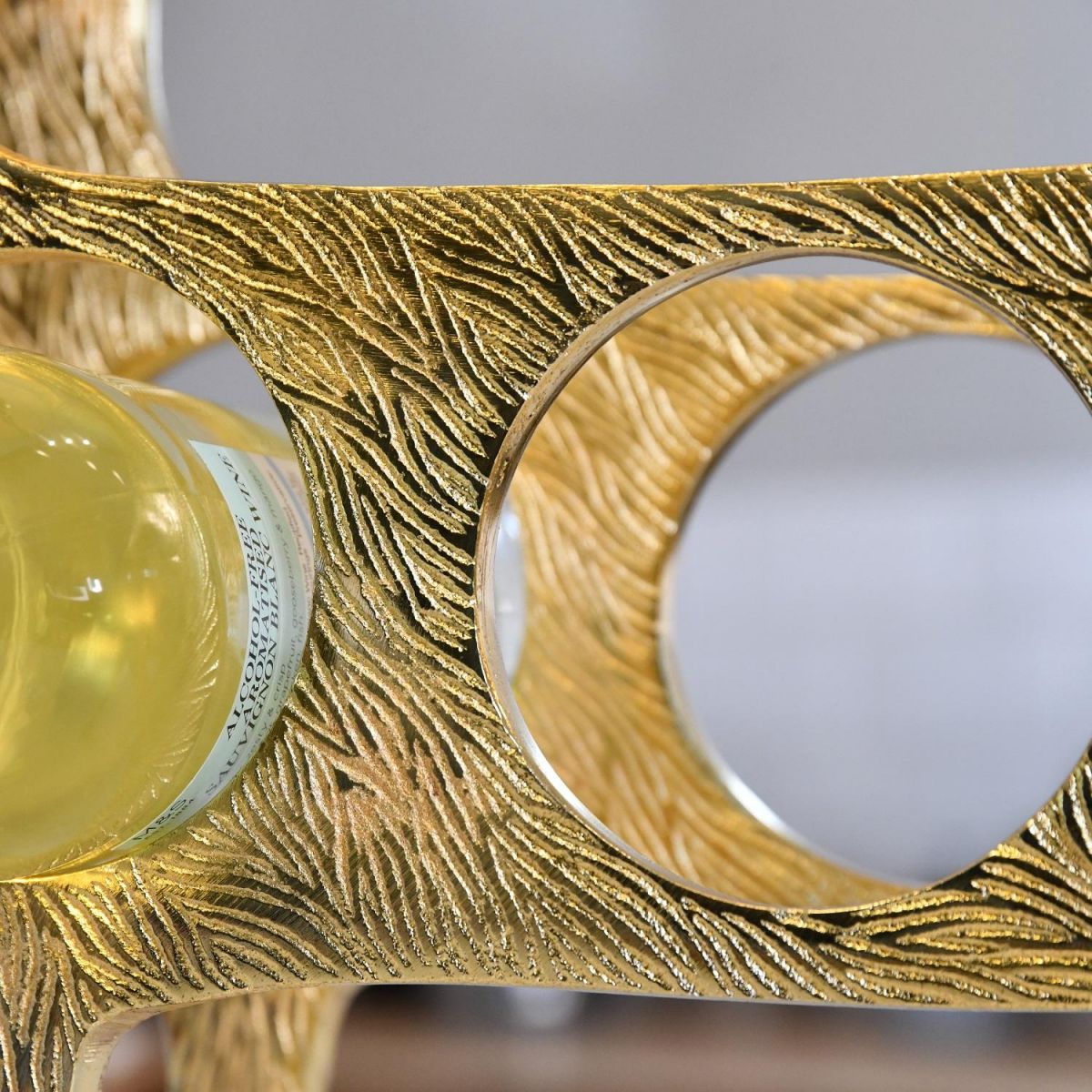 Close up of etched detailing on wine rack 