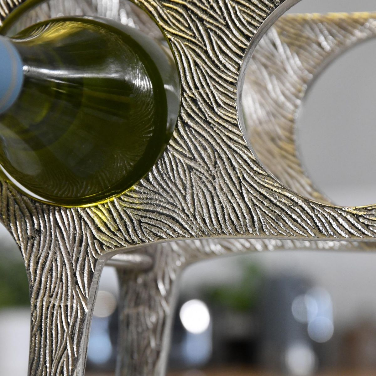 Close up of etched detailing on wine rack 